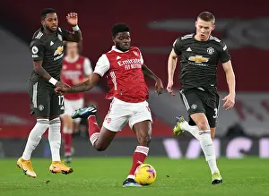 Arsenal V Manchester United 2020-21 Prints: Thomas Partey vs. Fred and McTominay: A Battle in the Empty Emirates - Arsenal vs