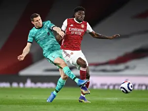 Thomas Partey vs. James Milner: A Battle of Midfield Titans at Empty Emirates - Arsenal vs. Liverpool (2020-21)