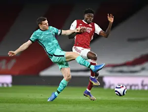 Thomas Partey vs. James Milner: Intense Battle in Empty Emirates Stadium - Arsenal v Liverpool, 2021-22 Premier League