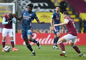 Thomas Partey vs. Josh Brownhill: A Battle at Turf Moor in the Empty Premier League