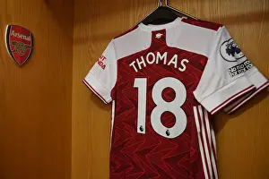 Thomas Partey's Empty Arsenal Shirt: A Silent Emirates Stadium for Arsenal vs Leicester City (2020-21)