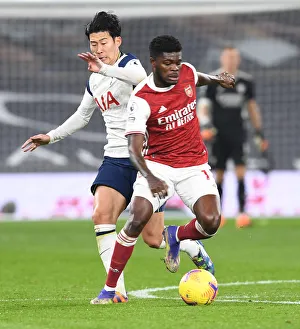 Tottenham Hotspur V Arsenal 2020-21 Prints: Thomas Partey's Dominance: Arsenal's Premier League Triumph Over Tottenham - Partey Outmuscles Son Heung-Min