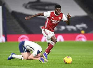 Tottenham Hotspur V Arsenal 2020-21 Prints: Thomas Partey's Powerful Surge: Arsenal's Triumph Over Tottenham