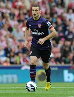 Images Dated 26th August 2012: Thomas Vermaelen in Action: Stoke City vs Arsenal, Premier League 2012-13