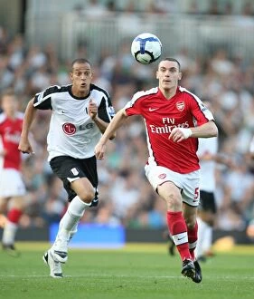 Images Dated 26th September 2009: Thomas Vermaelen (Arsenal) Bobby Zamora (Fulham)