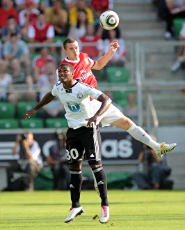 Legia Warsaw v Arsenal 2010-11 Gallery: Thomas Vermaelen (Arsenal) Bruno Mezenga (Leiga). Legia Warsaw 5: 6 Arsenal