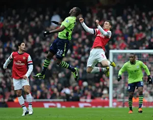Arsenal V Aston Villa - 2012-13 Prints: Thomas Vermaelen (Arsenal) Christian Benteke (Villa). Arsenal 2: 1 Aston Villa. Barclays