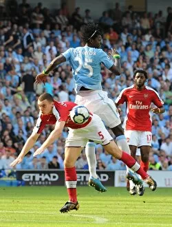 Images Dated 12th September 2009: Thomas Vermaelen (Arsenal) Emmanuel Adebayor (Man City)