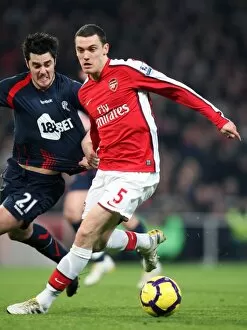 Images Dated 20th January 2010: Thomas Vermaelen (Arsenal) holds off Tamir Cohen (Bolton). Arsenal 4: 2 Bolton Wanderers