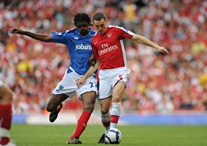 Thomas Vermaelen Gallery: Thomas Vermaelen (Arsenal) Kanu (Portsmouth)