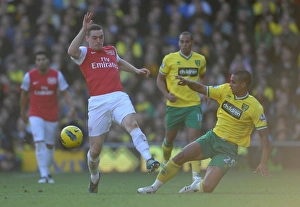 Images Dated 19th November 2011: Thomas Vermaelen (Arsenal) Kyle Naughton (Norwich). Norwich City v Arsenal