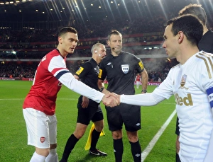 Arsenal v Swansea - FA Cup 3rd Rd Replay 2012-13 Gallery: Thomas Vermaelen (Arsenal) Leon Britton (Swansea) with the officials. Arsenal 1: 0 Swansea City