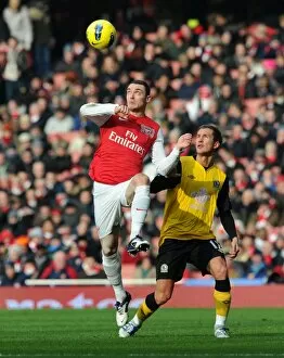 Images Dated 4th February 2012: Thomas Vermaelen (Arsenal) Morten Gamst Pedersen (Rovers). Arsenal 7: 1 Blackburn Rovers