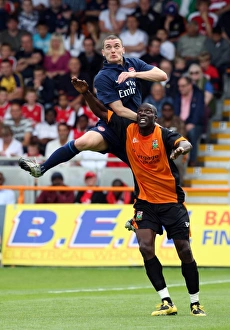 Thomas Vermaelen (Arsenal) Paul Furlong (Barnet) Thomas Vermaelen (Arsenal) Paul Furlong (Barnet)
