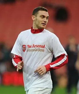 Thomas Vermaelen (Arsenal) warms up in his Arsenal Foundation T Shirt before the match