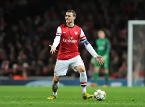 Arsenal V Montpellier 2012-13 Prints: Thomas Vermaelen: Arsenal's Defensive Powerhouse in Action against Montpellier