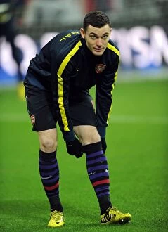 Bayern Munich Collection: Thomas Vermaelen: Arsenal's Defiant Face-off Against Bayern Munchen in the UEFA Champions League