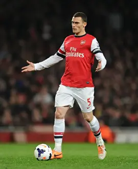 Thomas Vermaelen: Arsenal's Focused Defender in Action Against Swansea City (2013-14)