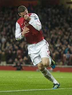 Thomas Vermaelen celebrates scoring the Arsenal goal during the Barclays Premier League match between Arsenal Thomas Vermaelen celebrates scoring the Arsenal goal during the Barclays Premier League match between Arsenal