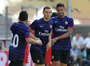 Thomas Vermaelen celebrates scoring Arsenals 1st goal with Santi Cazorla and Olivier Giroud