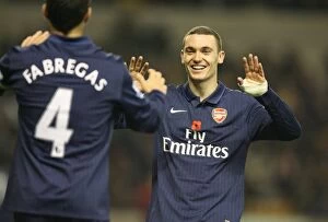 Images Dated 7th November 2009: Thomas Vermaelen and Cesc Fabregas celebrate the 4th Arsenal goal