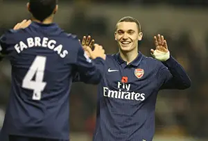 Thomas Vermaelen and Cesc Fabregas celebrate the 4th Arsenal goal