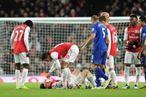 Images Dated 10th December 2011: Thomas Vermaelen Injured: Heartbreak for Arsenal Against Everton (2011-12)