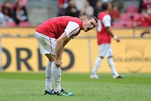 Cologne v Arsenal Collection: Thomas Vermaelen Leads Arsenal in Pre-Season Clash against Cologne