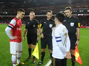 Arsenal V Swansea - FA Cup 3rd Rd Replay 2012-13 Prints: Thomas Vermaelen and Leon Britton Face Off: Arsenal's Victory Over Swansea City in FA Cup 3rd Round (1:0)