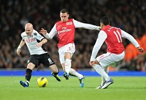 Images Dated 26th November 2011: Thomas Vermaelen vs. Andy Johnson: A Battle at the Emirates (Arsenal v Fulham, 2011-12)