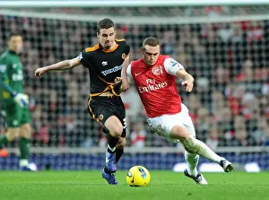 Arsenal V Wolverhampton Wanderers 2011-2012 Prints: Thomas Vermaelen vs. Anthony Forde: A Battle at Emirates Stadium