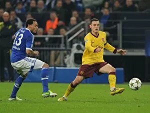 Schalke 04 v Arsenal 2012-13 Collection: Thomas Vermaelen vs. Jermaine Jones: Battle in the UEFA Champions League