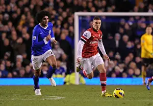 Everton V Arsenal 2012-13 Prints: Thomas Vermaelen vs Marouane Fellaini: A Premier League Showdown at Goodison Park, 2012-13