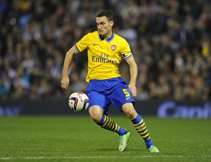 West Bromwich Albion V Arsenal 2013-14 - Capital Cup Prints: Thomas Vermaelen at West Bromwich Albion: Arsenal's Defender in Capital One Cup Clash