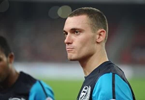 Images Dated 13th July 2011: Thomas Vermaelen's Dominant Display: Arsenal Crushes Malaysia XI 4-0