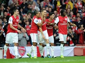 Arsenal v West Bromwich Albion 2011-12 Collection: Thomas Vermaelen's Double: Arsenal Crushes West Bromwich Albion 3-0 in Premier League