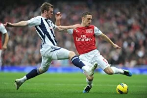 Arsenal v West Bromwich Albion 2011-12 Collection: Thomas Vermaelen's Triumph: Arsenal's 3-0 Victory Over West Bromwich Albion in the Premier League