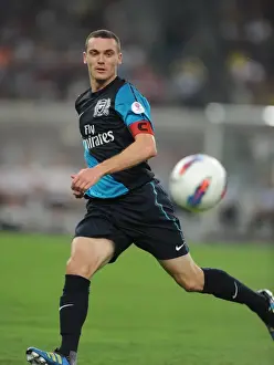 Malaysia XI V Arsenal Prints: Thomas Vermaelen's Unstoppable Performance: Arsenal's 4-0 Triumph Over Malaysia XI