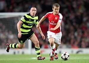 Wilshere Jack Collection: Thrilling Arsenal Victory: Jack Wilshere's Dominance Over Scott Brown in the UEFA Champions League