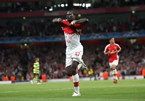 Arsenal V Celtic 2009-10 Prints: Thrilling Moment: Emmanuel Eboue Scores the Decisive Goal for Arsenal in UEFA Champions League Victory over Celtic