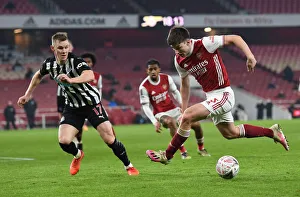 Tierney vs Krafth: A FA Cup Battle Clash at Arsenal