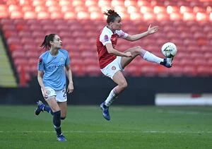 Arsenal v Manchester City - Continental Cup Final 2019 Collection: A Tight Battle: Veje vs. Wullaert in the Arsenal vs. Manchester City FA WSL Continental Cup Final