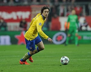 Images Dated 11th March 2014: Tomas Rosicky in Action: Arsenal vs. FC Bayern Munich, UEFA Champions League 2013-14