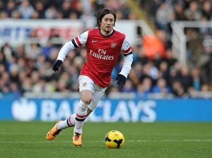 Newcastle United Collection: Tomas Rosicky: Action-Packed Performance Against Newcastle United, Premier League 2013-14