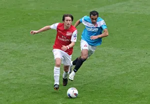 Tomas Rosicky (Arsenal) Ahmed Elmohamady (Sunderland). Arsenal 2: 1 Sunderland