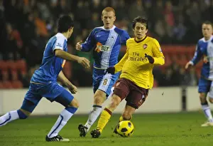 Wigan Athletic V Arsenal 2010-11 Prints: Tomas Rosicky (Arsenal) Antonlin Alcaraz and Ben Watson (Wigan). Wigan Athletic 2