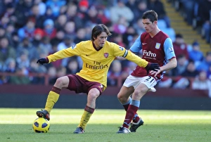 Aston Villa v Arsenal 2010-11 Gallery: Tomas Rosicky (Arsenal) Ciaran Clark (Villa). Aston Villa 2: 4 Arsenal. Barclays Premier League