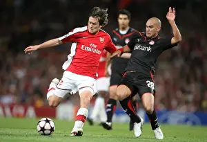 Tomas Rosicky (Arsenal) Cristian Ledesma (Olympiacos)