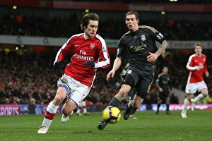 Arsenal v Liverpool 2009-10 Gallery: Tomas Rosicky (Arsenal) Daniel Agger (Liverpool). Arsenal 1: 0 Liverpool