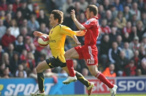 Liverpool v Arsenal 2006-7 Collection: Tomas Rosicky (Arsenal) Fabio Aurelio (Liverpool)